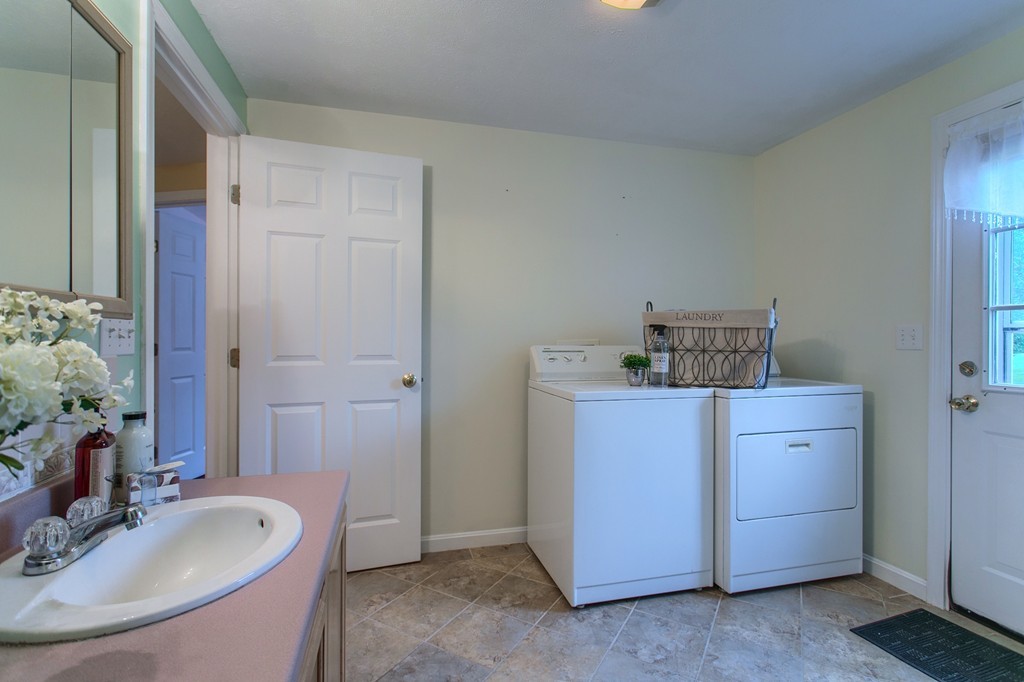 623 New Ipswich Road Ashby, MA 01431 - Photo 18 of 23 a bathroom with a granite countertop sink and a mirror