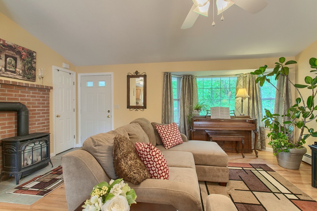 623 New Ipswich Road Ashby, MA 01431 - Photo 3 of 23 a living room with furniture and a fireplace