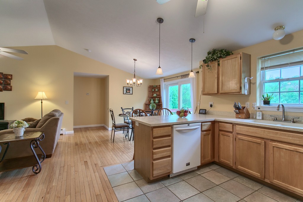 623 New Ipswich Road Ashby, MA 01431 - Photo 7 of 23 a kitchen with a sink a table and chairs in it