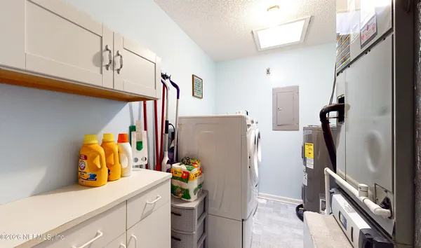 a view of a house with a yard balcony and sitting area