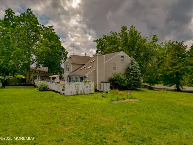 a view of road with large trees