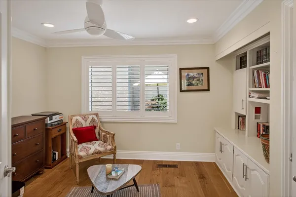a bed room with a bed and a desk
