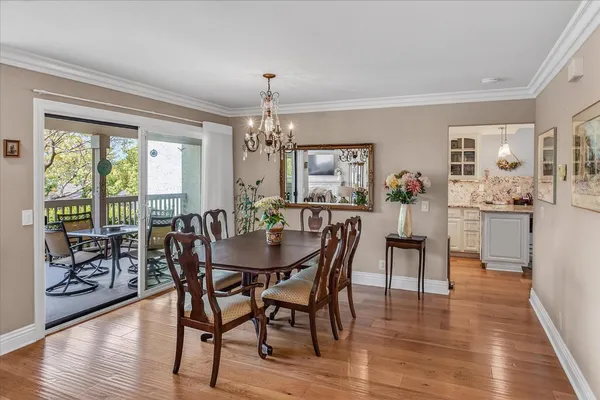 a kitchen with a sink appliances and cabinets