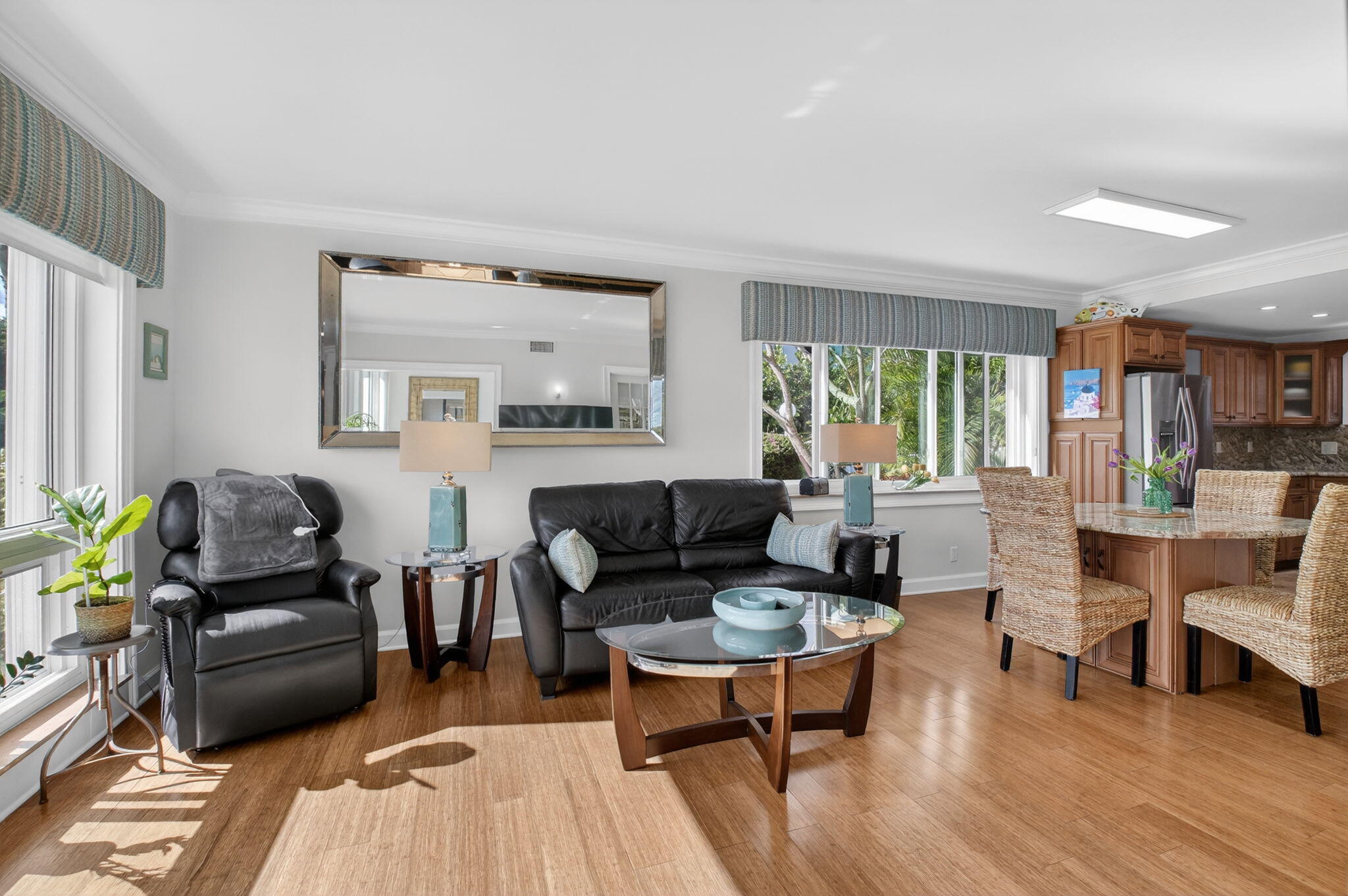 711 Northeast Harbour Terrace, Unit 3120 Boca Raton, FL 33431 - Photo 17 of 46 a living room with furniture and a wooden floor