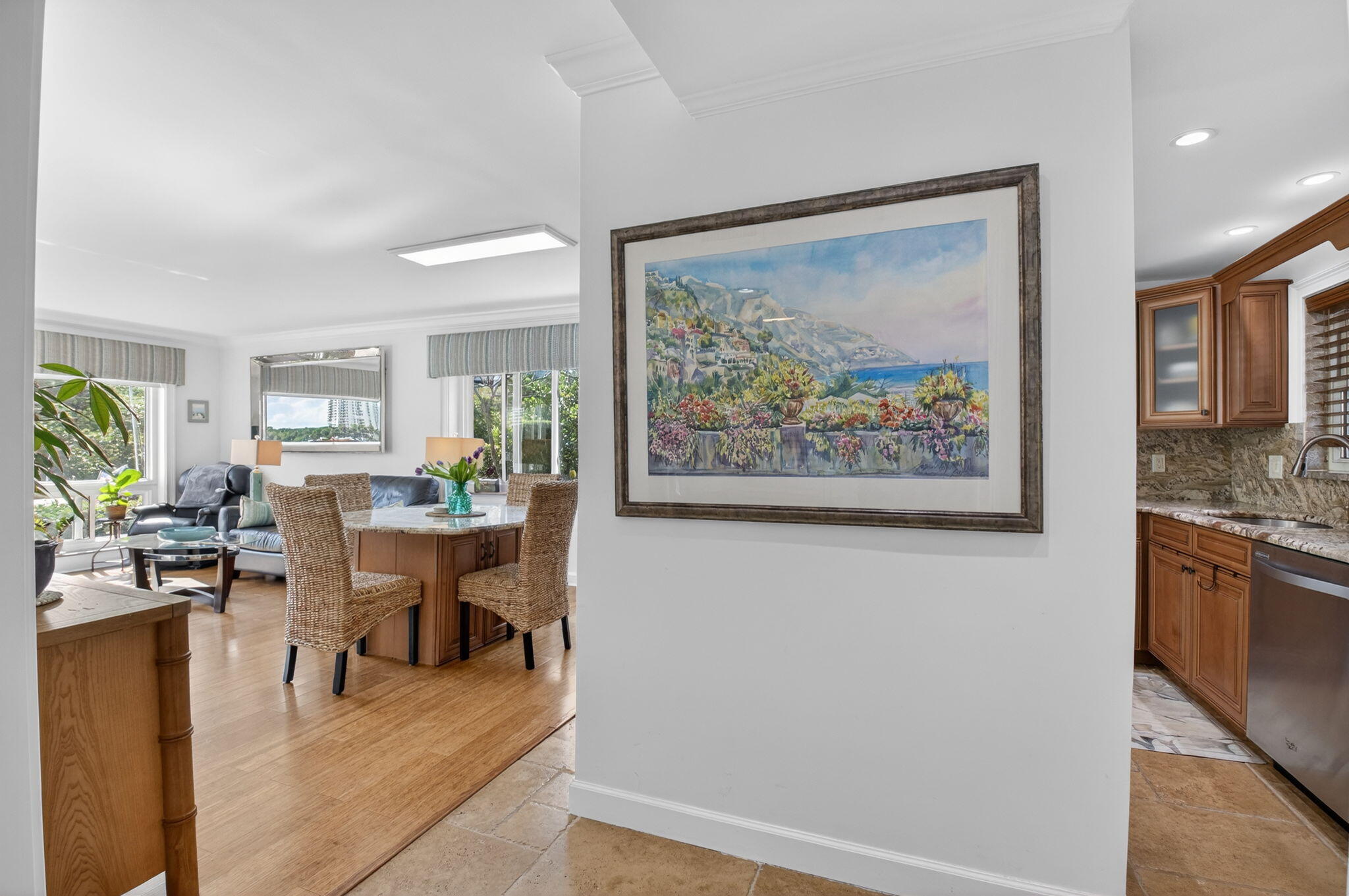 711 Northeast Harbour Terrace, Unit 3120 Boca Raton, FL 33431 - Photo 19 of 46 a dining room with wooden floor and a window