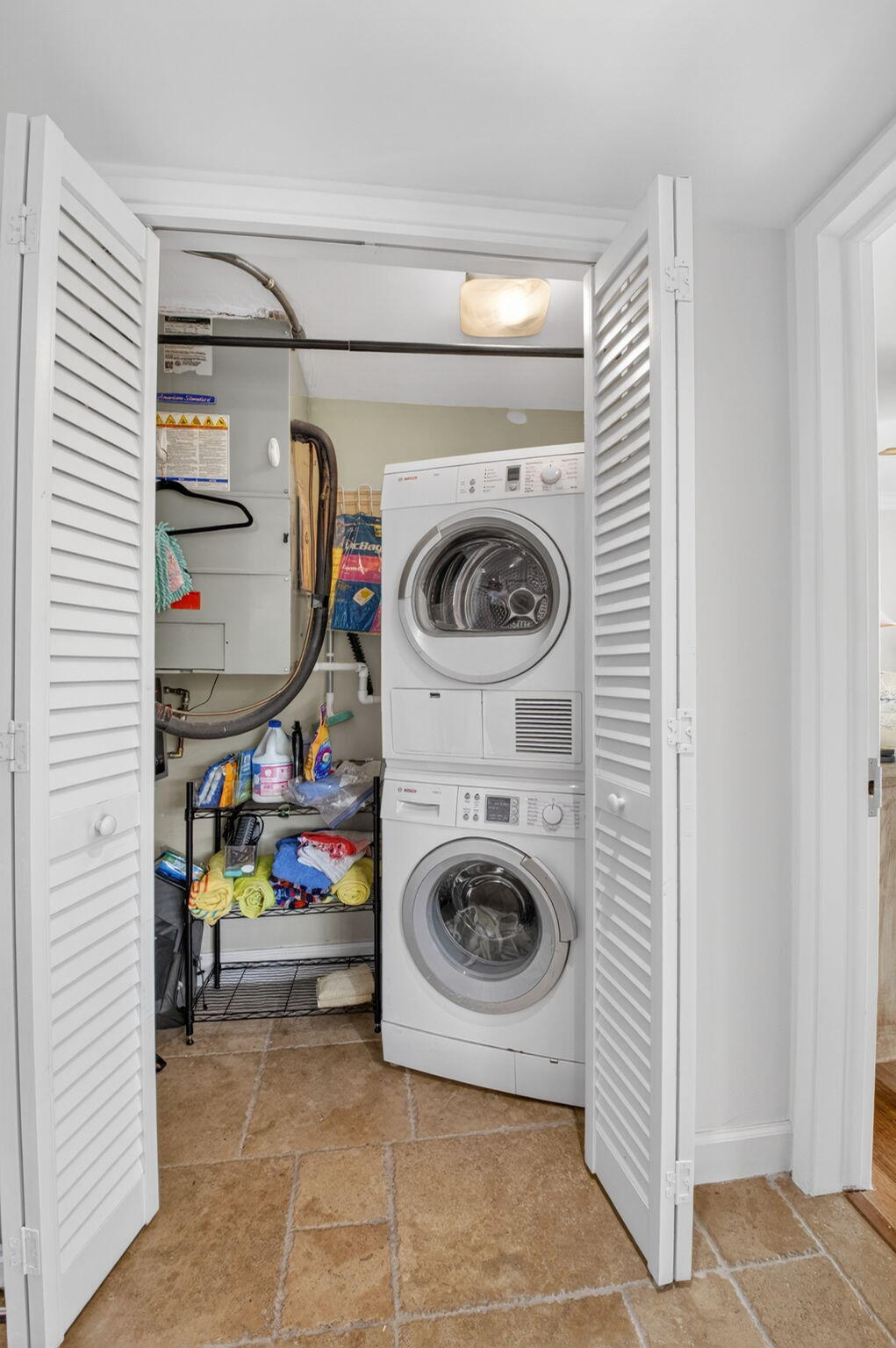 711 Northeast Harbour Terrace, Unit 3120 Boca Raton, FL 33431 - Photo 21 of 46 a utility room with dryer and washer