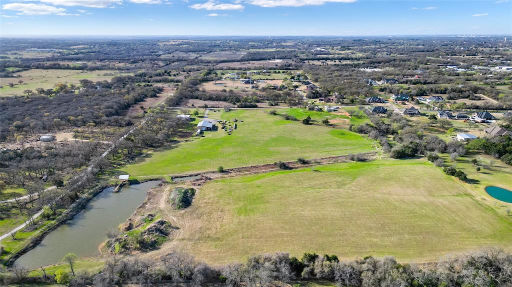 3345 Collins Road Burleson, TX 76028 - Photo 16 of 18 an aerial view of residential houses with outdoor space