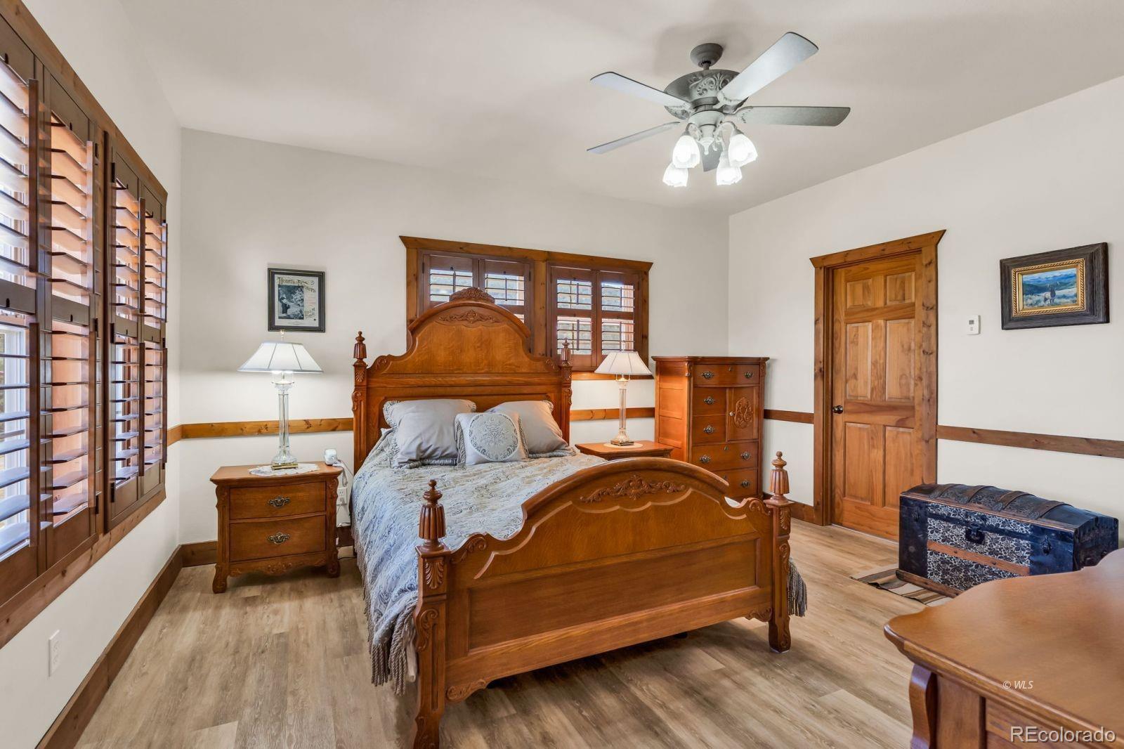 220 Rhonda Road Westcliffe, CO 81252 - Photo 23 of 35 a bedroom with a bed and window