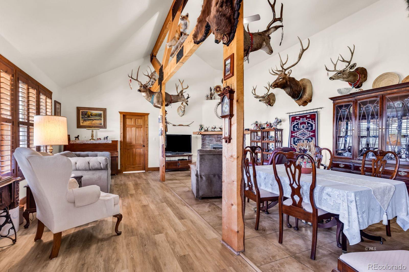 220 Rhonda Road Westcliffe, CO 81252 - Photo 3 of 35 a living room with furniture and wooden floor