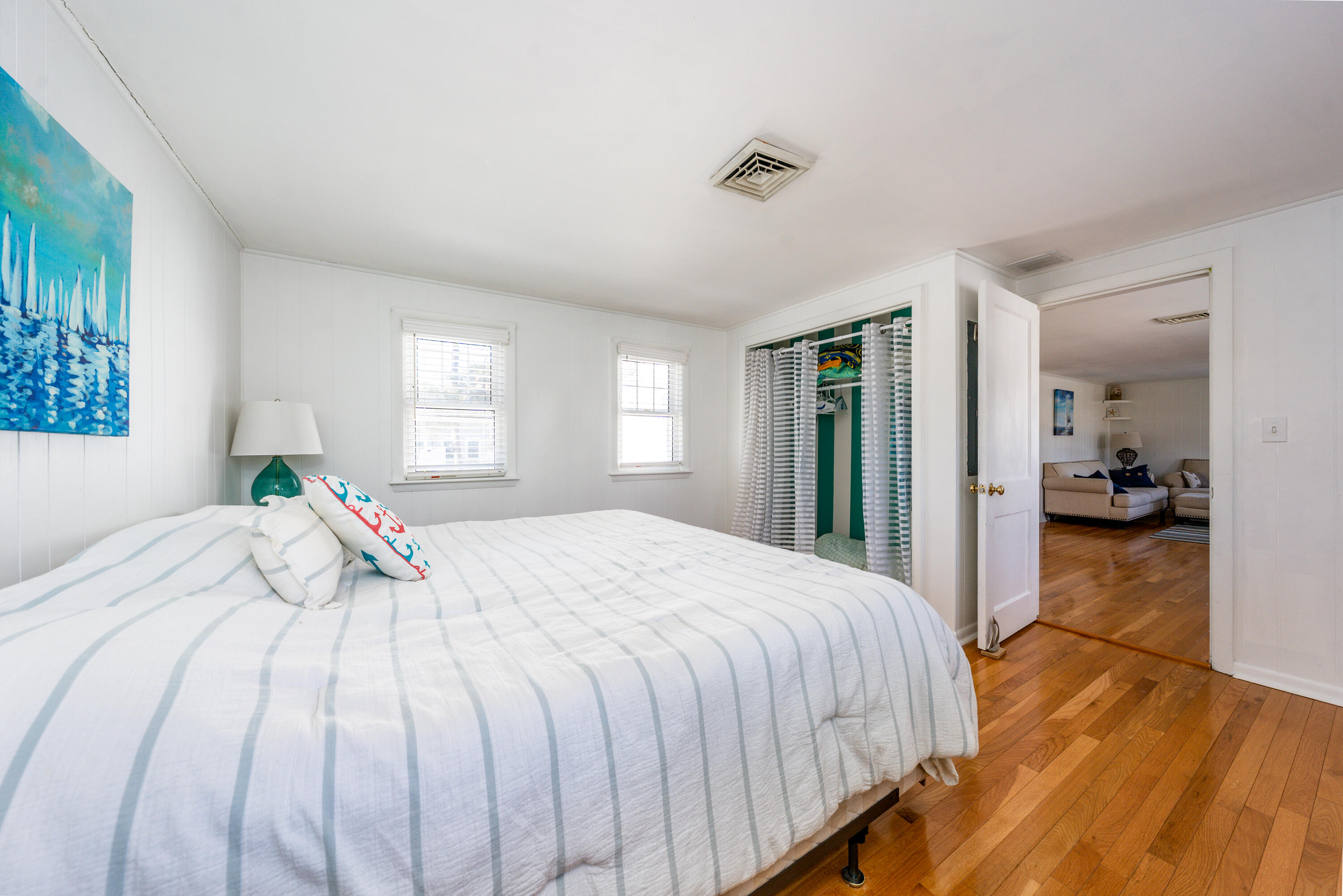 121 Sixth Avenue West Hyannisport, MA 02672 - Photo 14 of 35 a bedroom with a bed and a large window