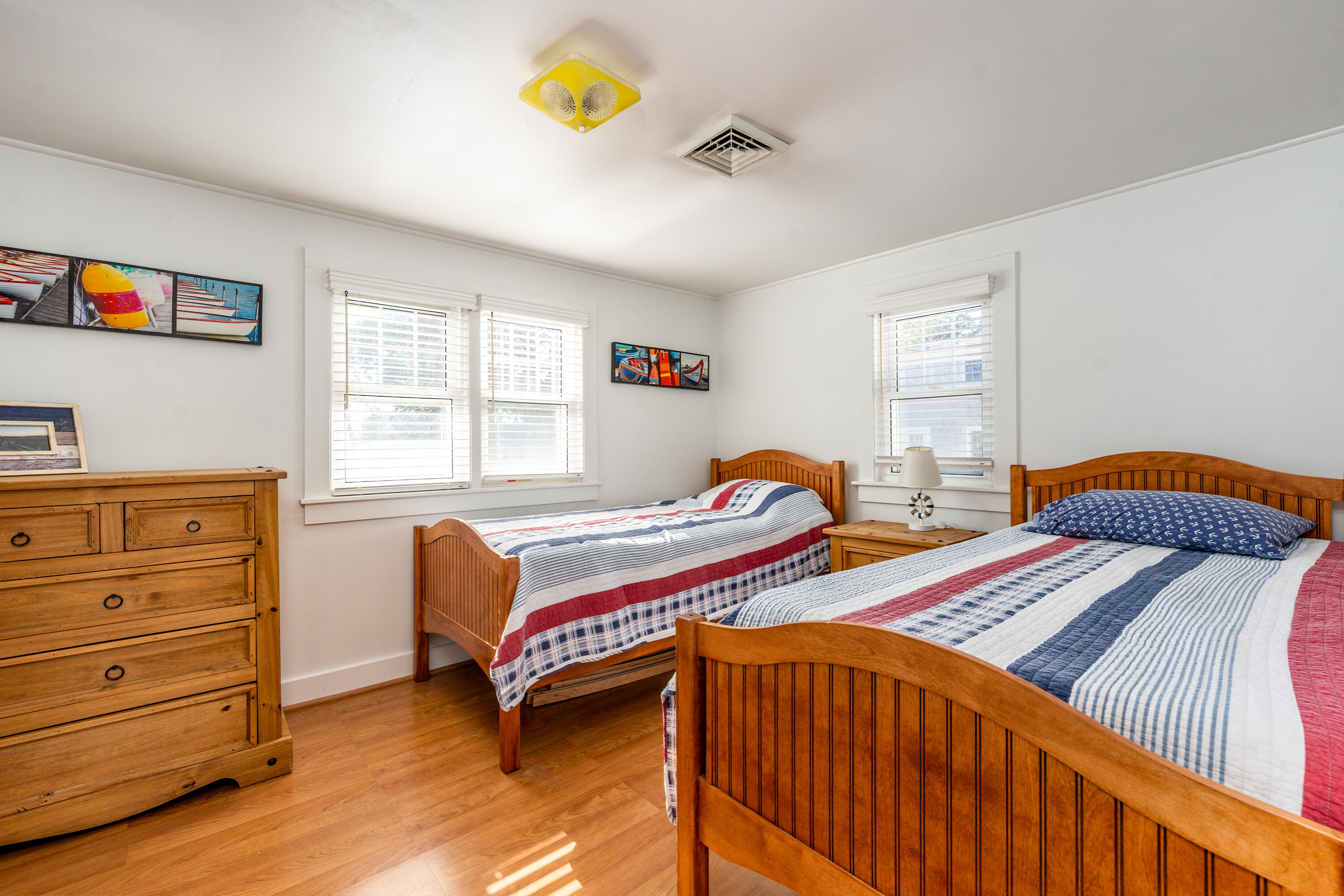 121 Sixth Avenue West Hyannisport, MA 02672 - Photo 16 of 35 a bedroom with two beds and a couch