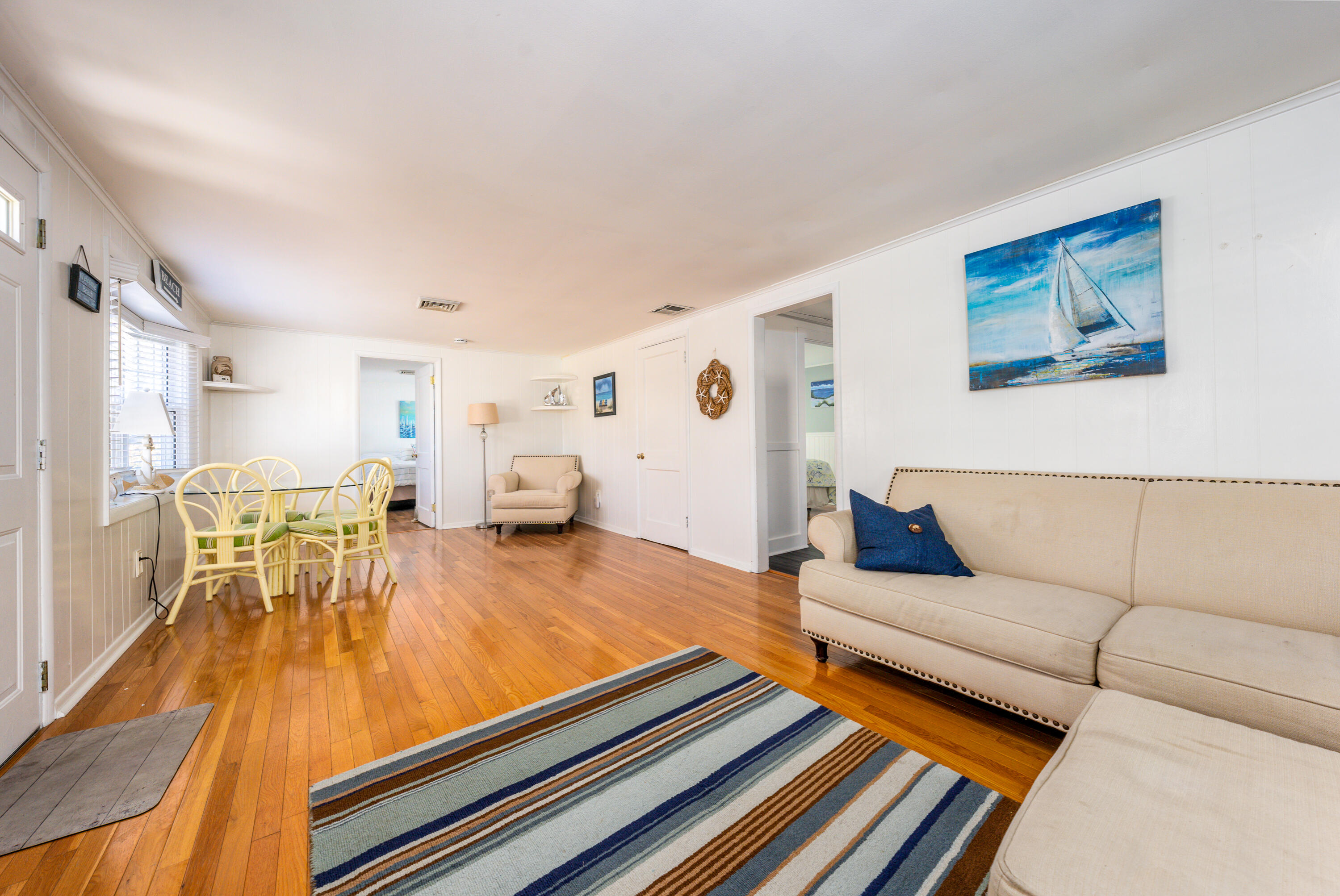 121 Sixth Avenue West Hyannisport, MA 02672 - Photo 3 of 35 a living room with furniture and a wooden floor