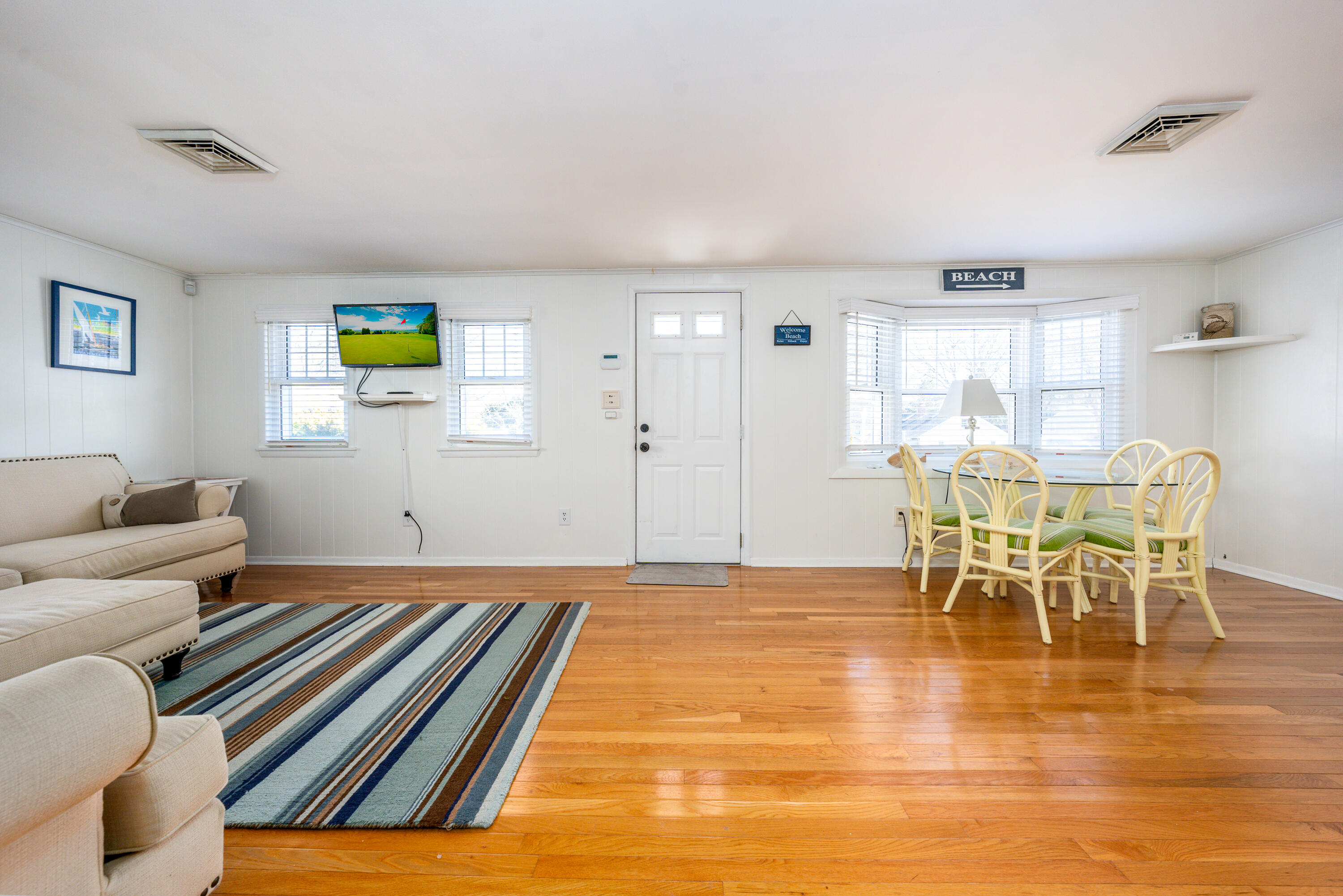 121 Sixth Avenue West Hyannisport, MA 02672 - Photo 4 of 35 a living room with furniture and wooden floor
