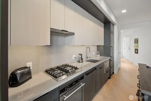 a bedroom with a bed and glass window