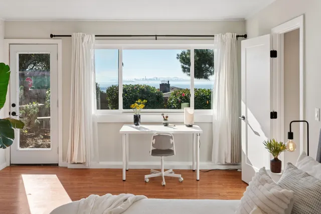 a view of a living room and a window