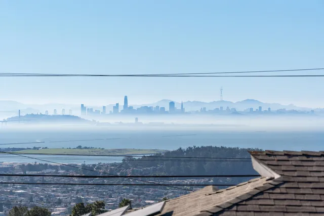 a view of a city with a lake