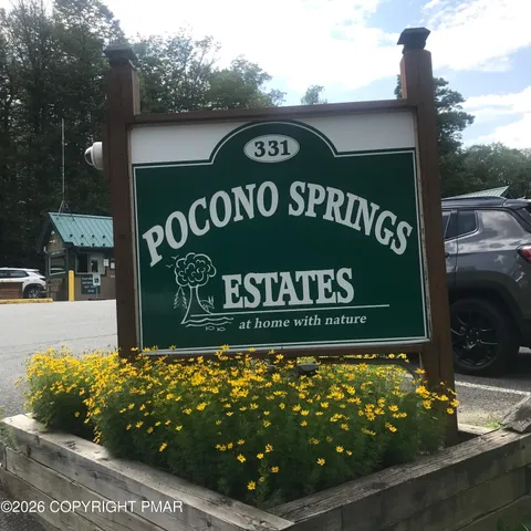 a sign on the side of the road