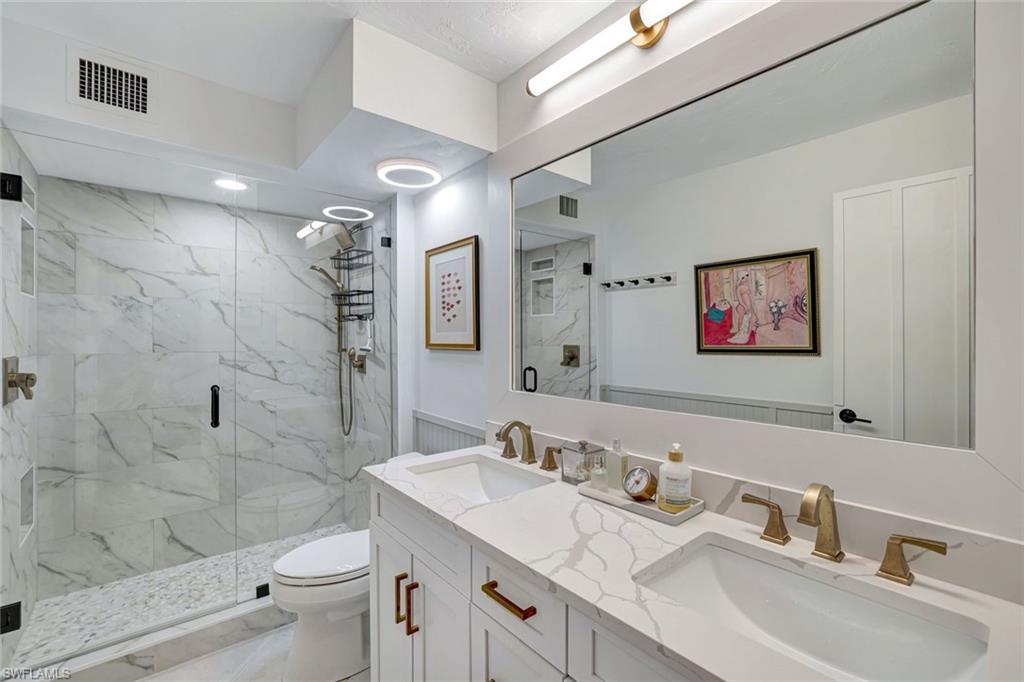3107 Riviera Drive, Unit A202 Naples, FL 34103 - Photo 12 of 25 Primary En-Suite Bath That Lives Like A Day At The Spa!
