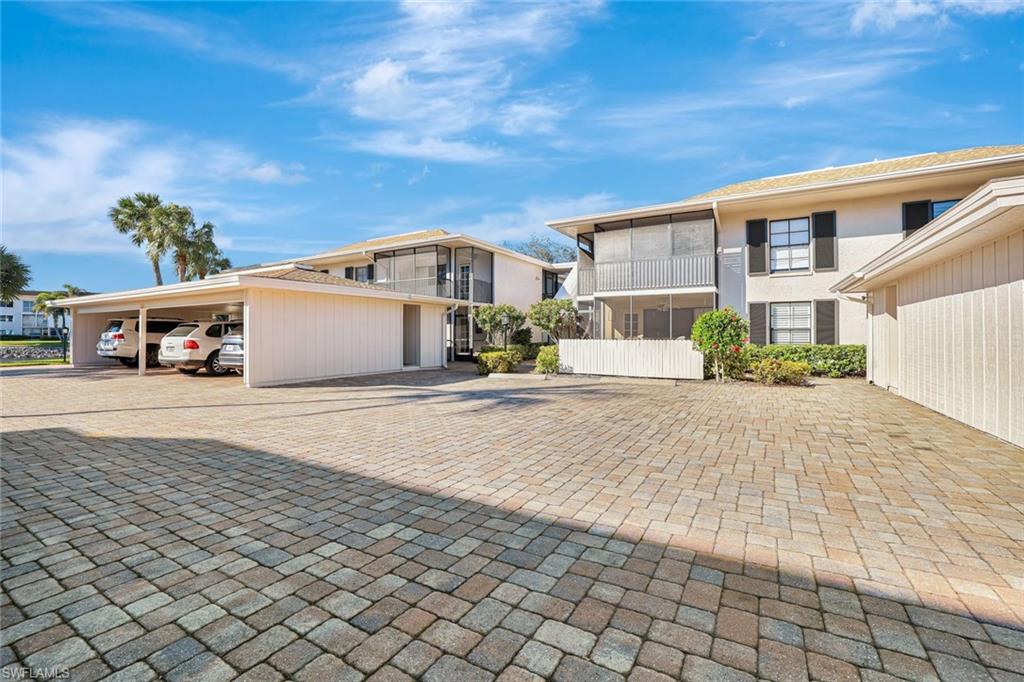 3107 Riviera Drive, Unit A202 Naples, FL 34103 - Photo 24 of 25 Dedicated, Covered Parking!