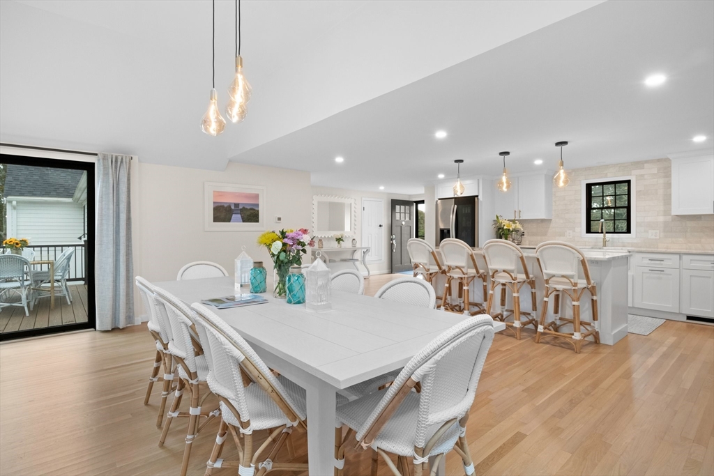 101 Monomoyic Way Chatham, MA 02633 - Photo 3 of 18 a view of a dining room with furniture
