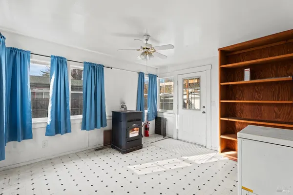 a room with furniture and a window