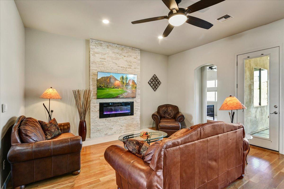 412 East Yearling Road Phoenix, AZ 85085 - Photo 9 of 51 a living room with furniture and a lamp