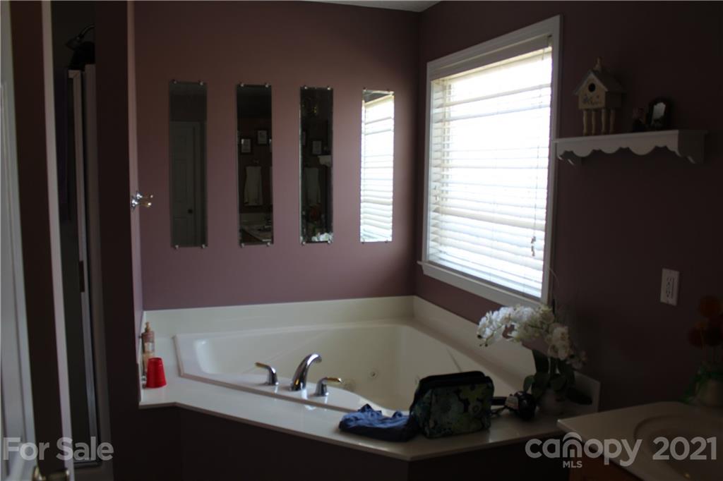 748 Maple Ridge Circle Salisbury, NC 28147 - Photo 22 of 27 a room with furniture and window