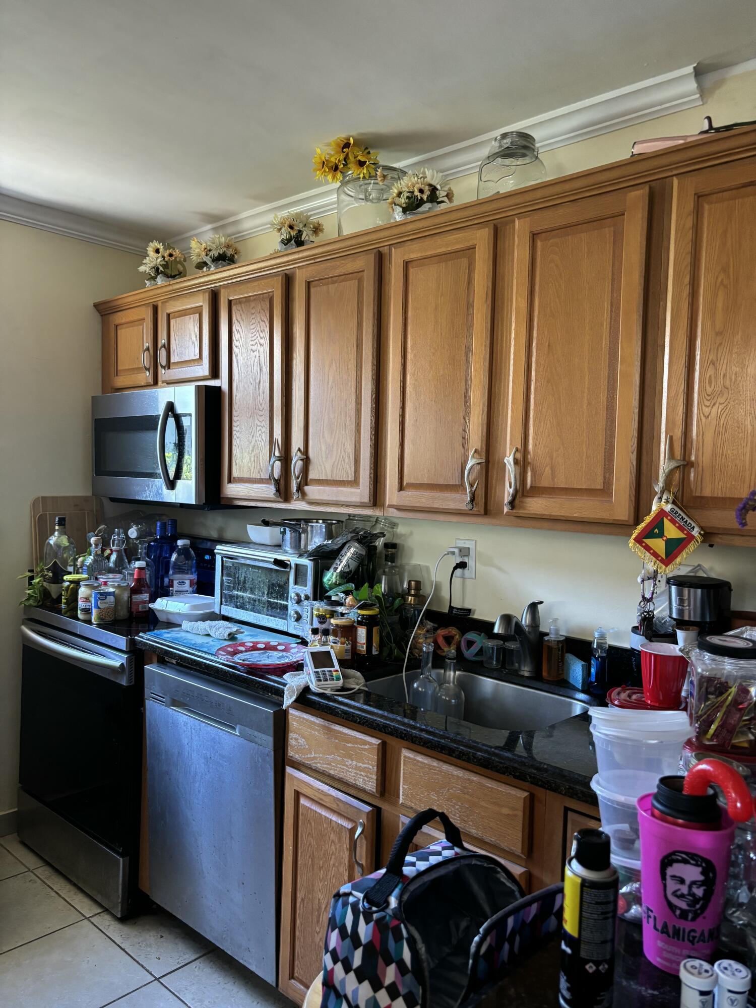 1130 Northeast 4th Street Pompano Beach, FL 33060 - Photo 3 of 3 a kitchen with lots of counter top space and cabinets