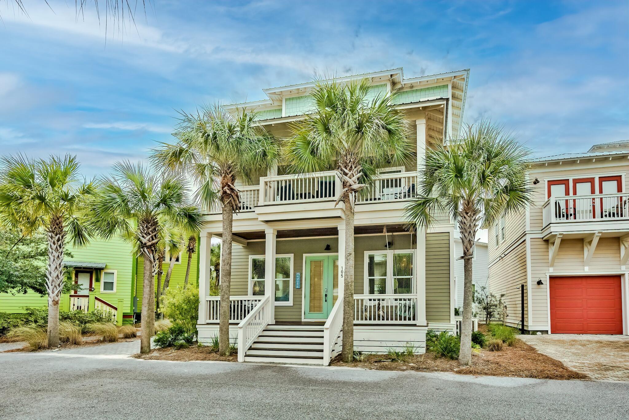 105 Blue Dolphin Loop Inlet Beach, FL 32461 - Photo 2 of 42 front view of a house with a garden