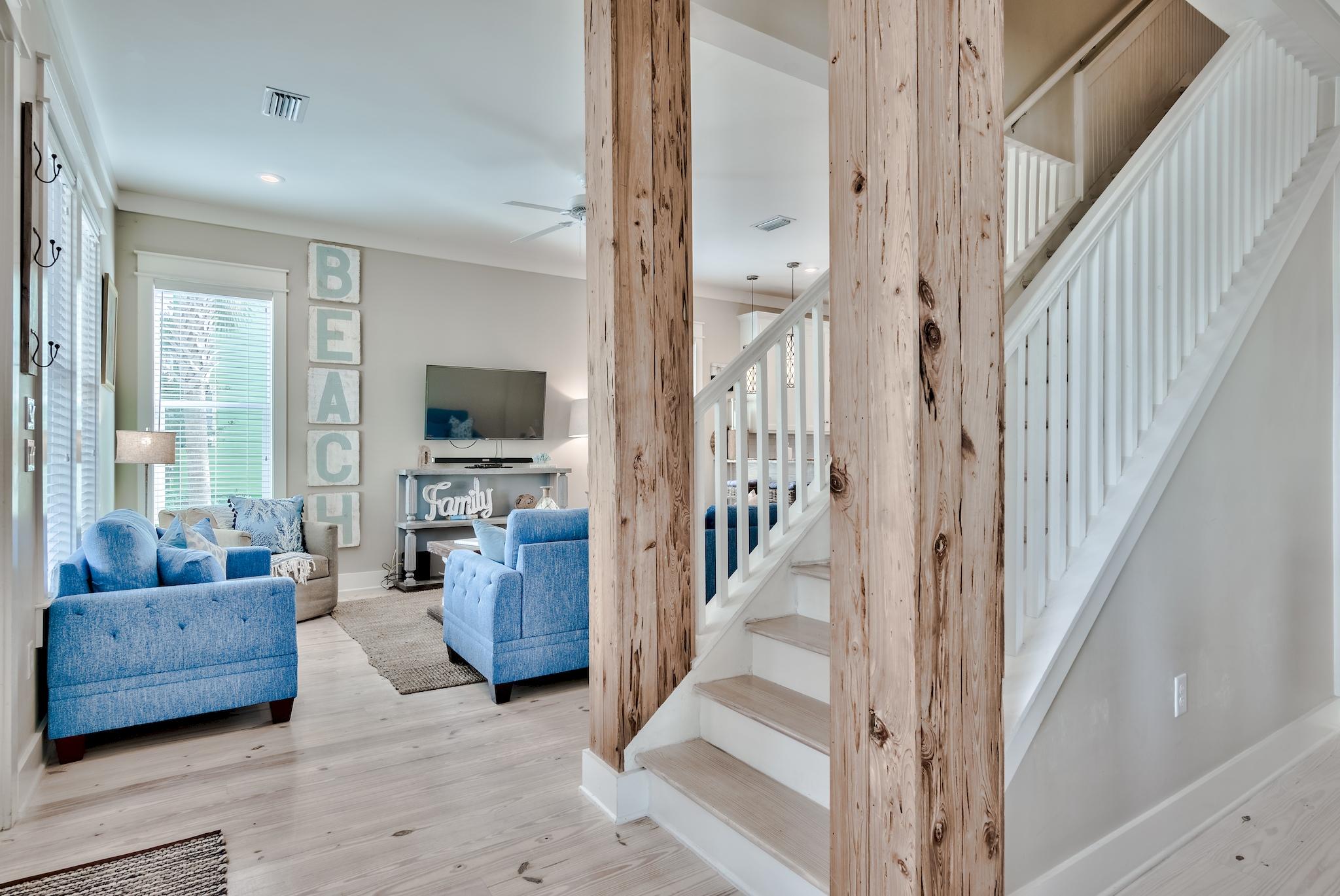105 Blue Dolphin Loop Inlet Beach, FL 32461 - Photo 15 of 42 a living room with furniture and a flat screen tv