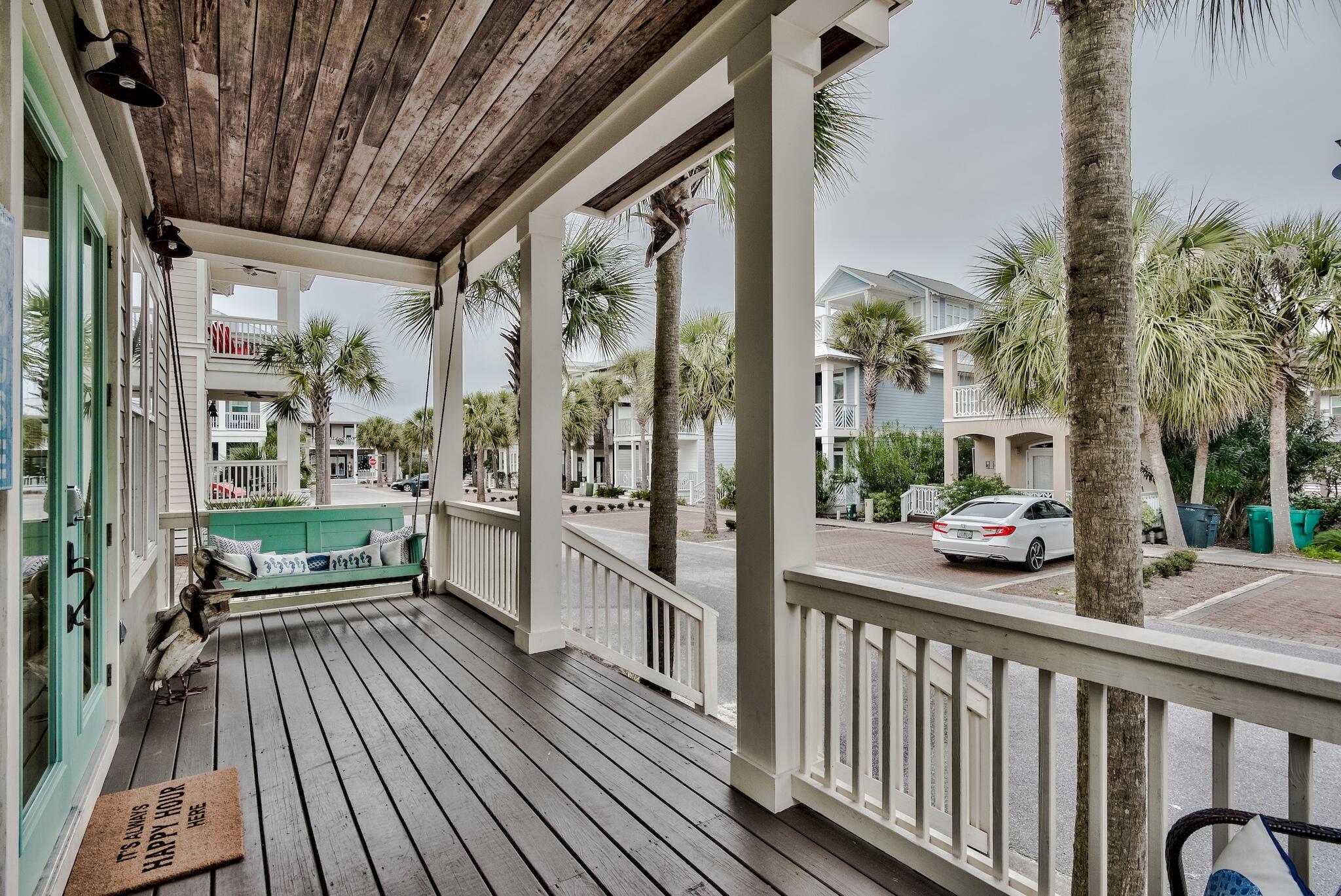 105 Blue Dolphin Loop Inlet Beach, FL 32461 - Photo 3 of 42 a view of a porch with furniture
