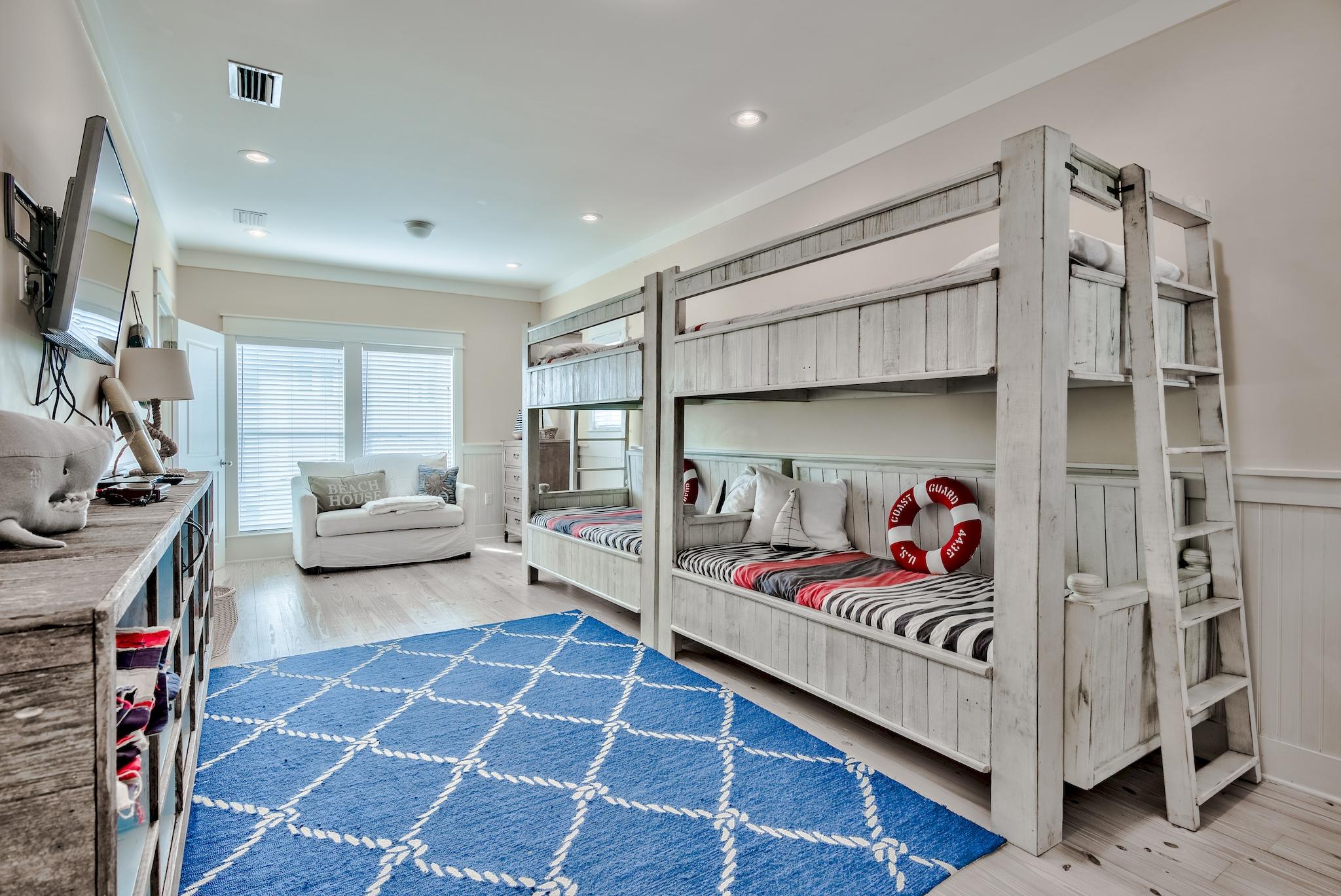 105 Blue Dolphin Loop Inlet Beach, FL 32461 - Photo 25 of 42 a bedroom with furniture and a couch