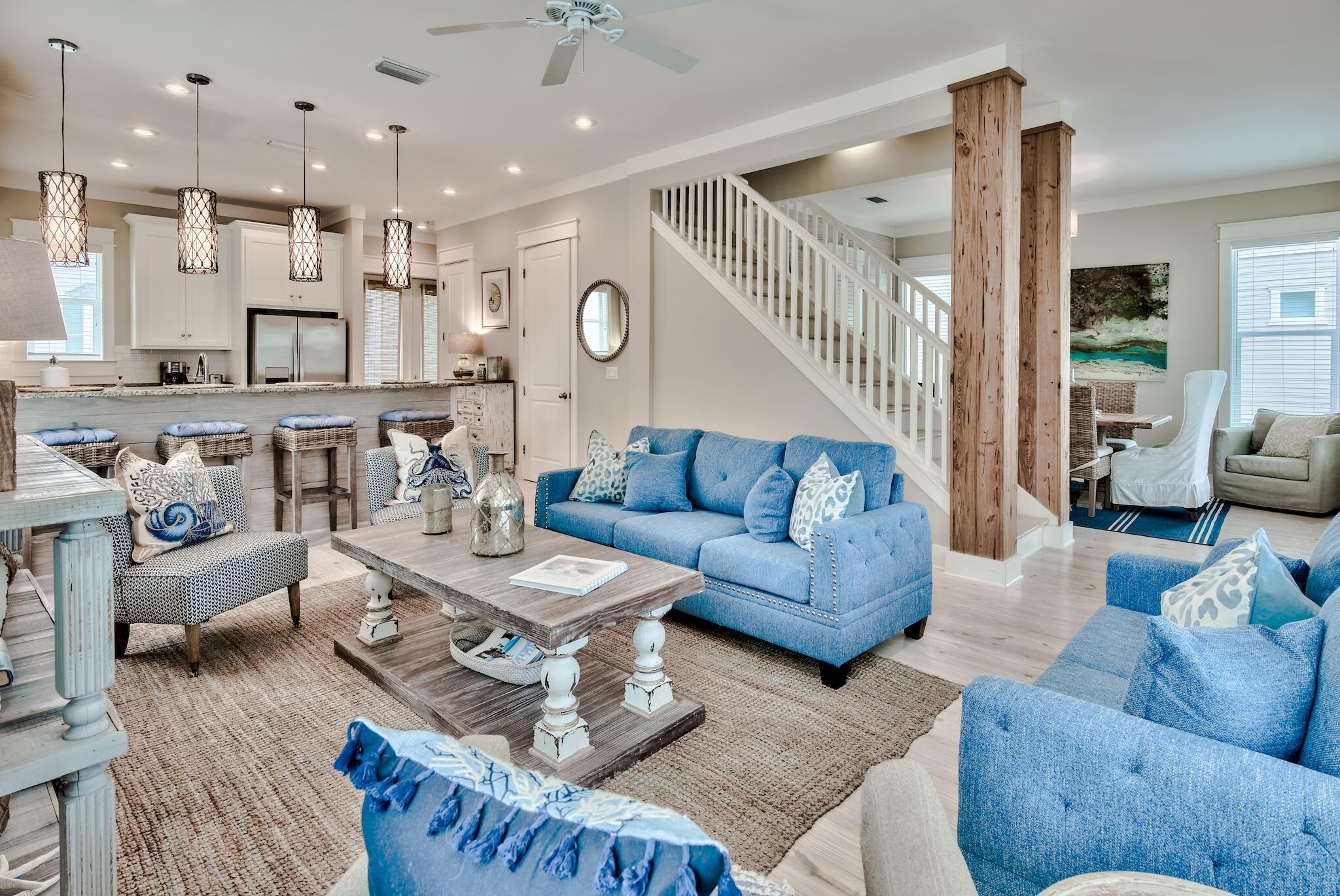 105 Blue Dolphin Loop Inlet Beach, FL 32461 - Photo 38 of 42 a living room with furniture kitchen view and a wooden floor