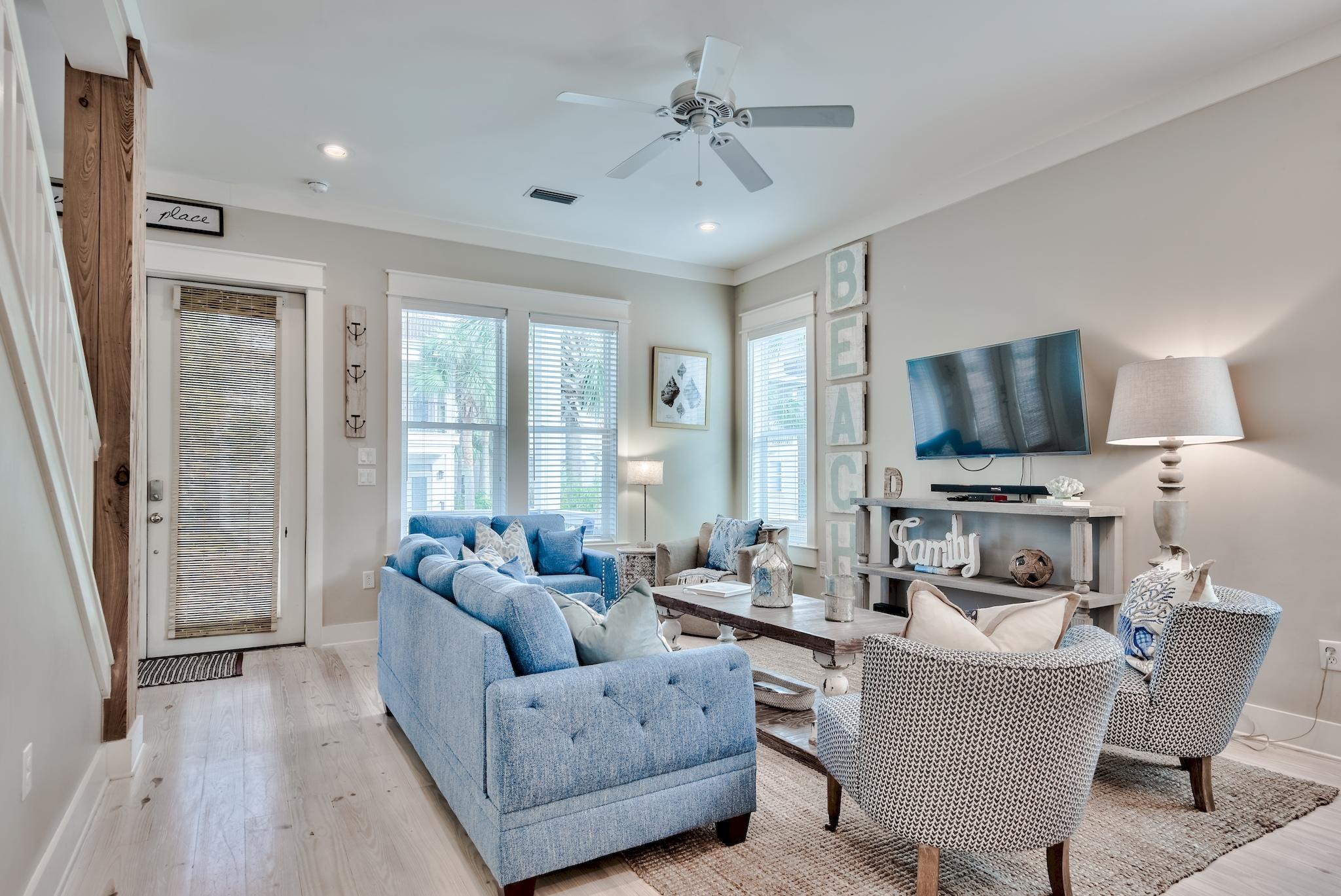 105 Blue Dolphin Loop Inlet Beach, FL 32461 - Photo 39 of 42 a living room with furniture and a large window