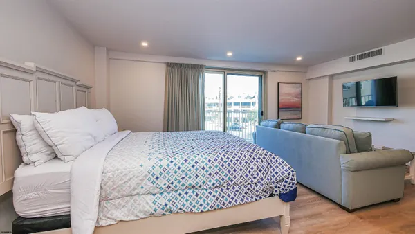 a view of a hallway with washer and dryer