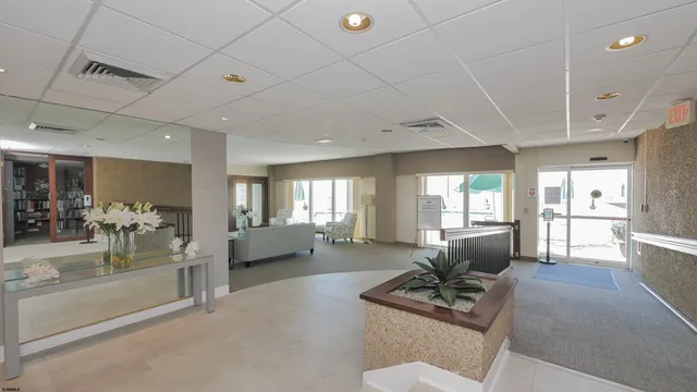 a view of a building with sitting area