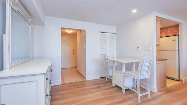 a spacious bathroom with a double vanity sink a mirror and a