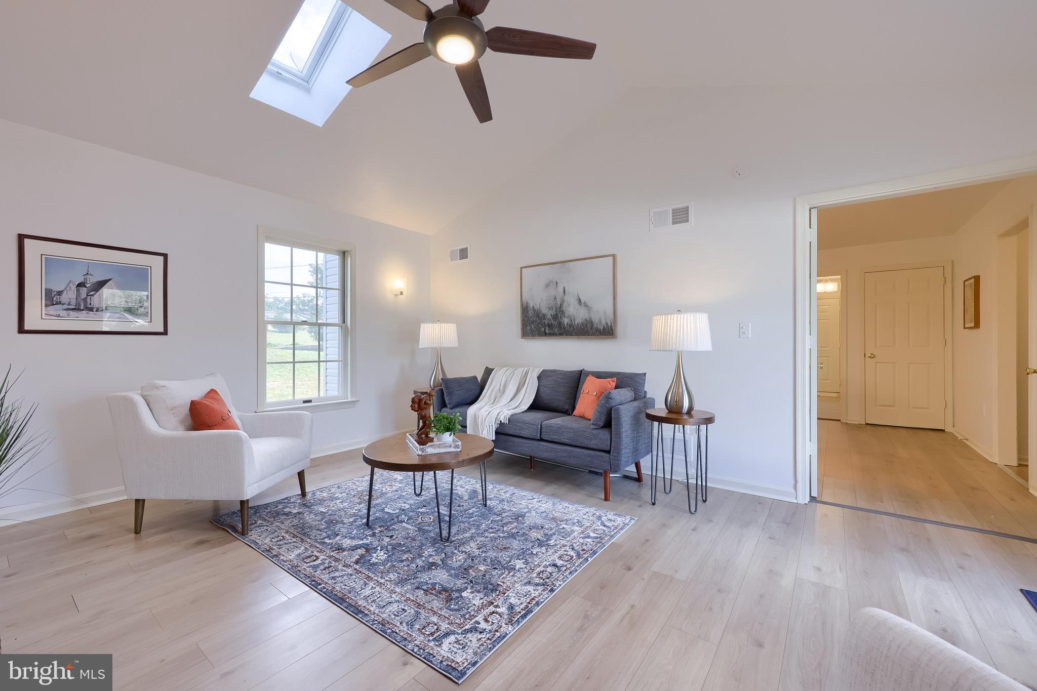 1 Brookwood Drive Lititz, PA 17543 - Photo 23 of 42 a living room with furniture and a rug
