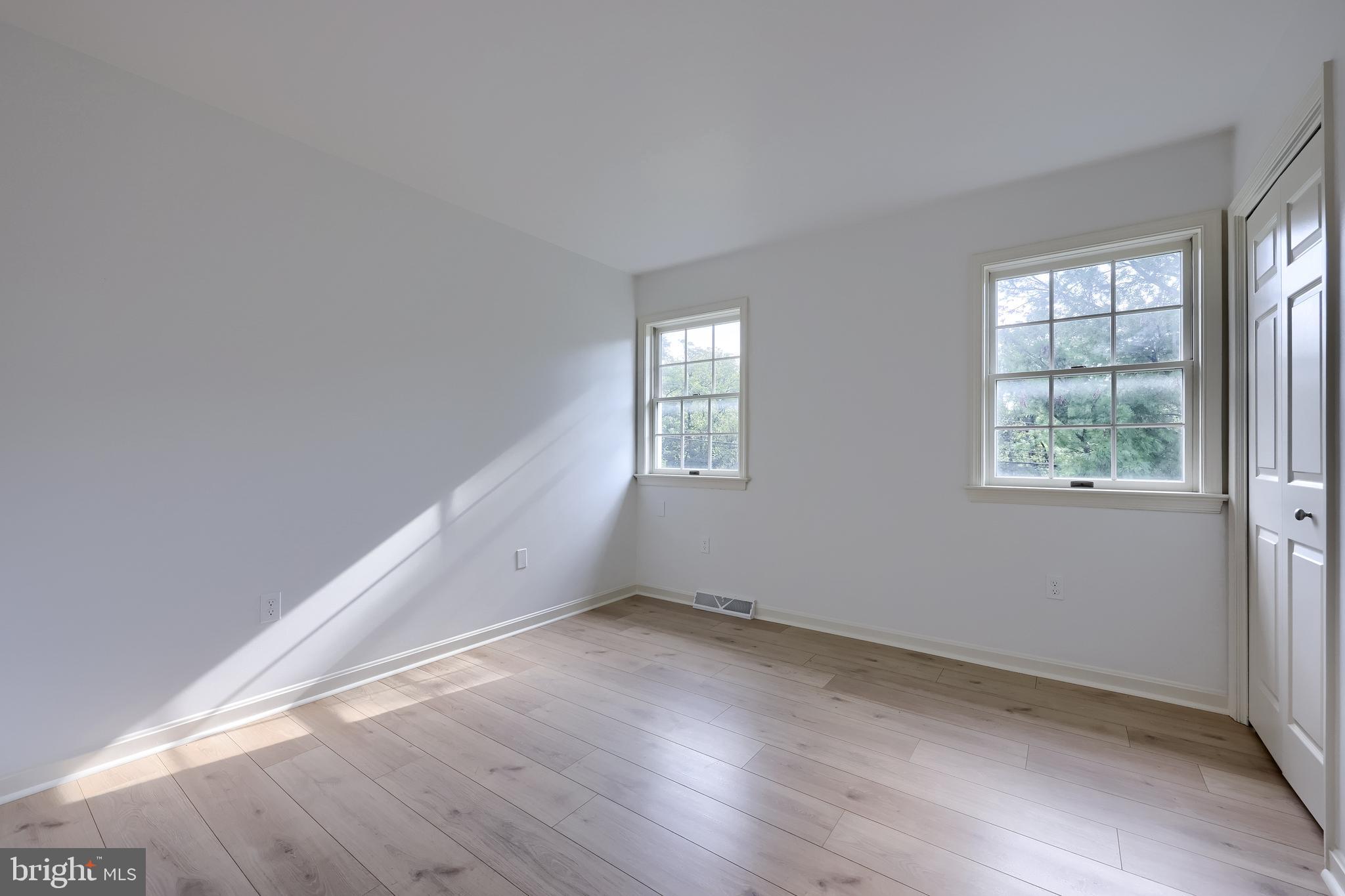 1 Brookwood Drive Lititz, PA 17543 - Photo 30 of 42 an empty room with wooden floor and windows