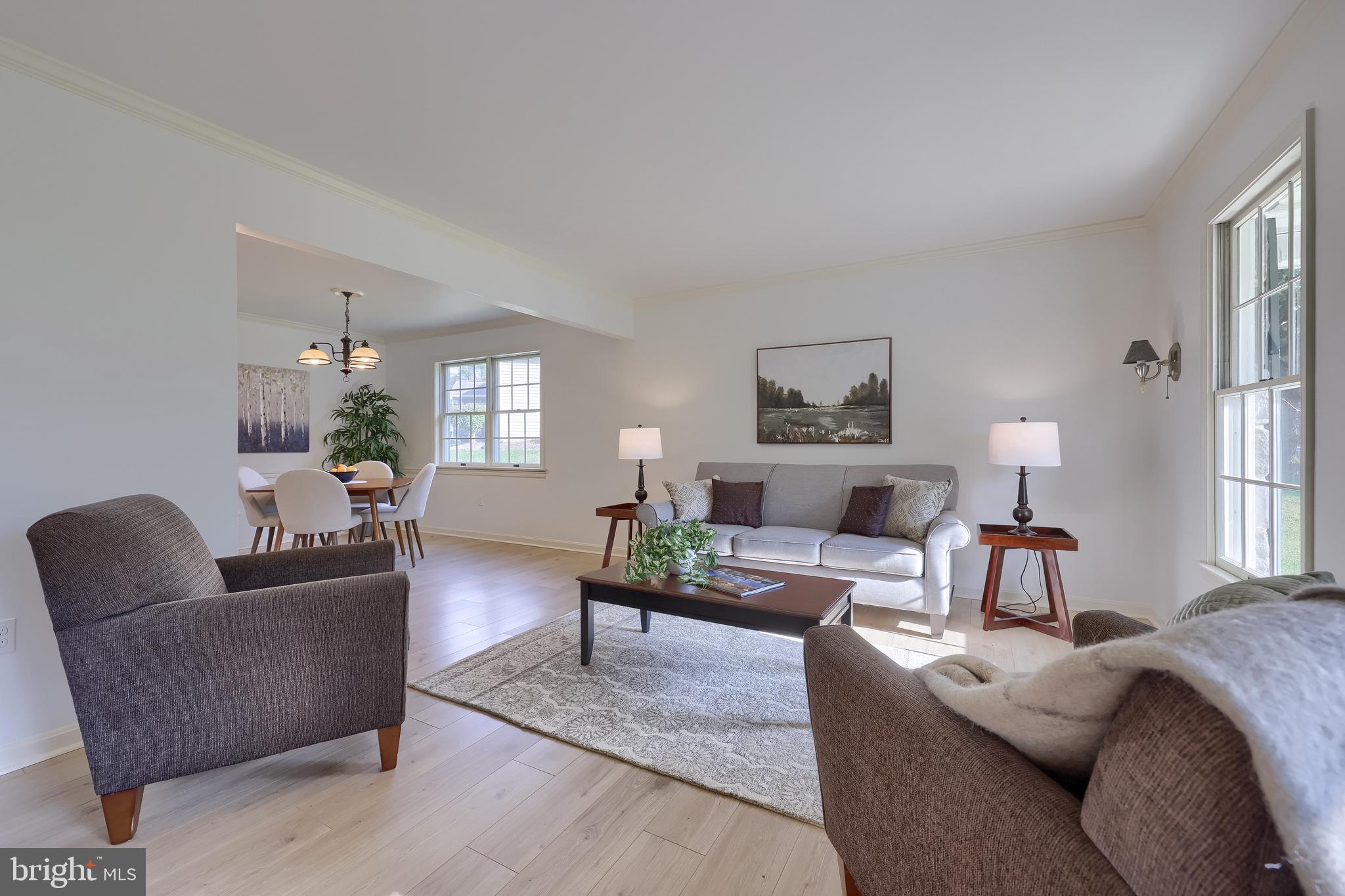 1 Brookwood Drive Lititz, PA 17543 - Photo 8 of 42 a living room with furniture and a lamp