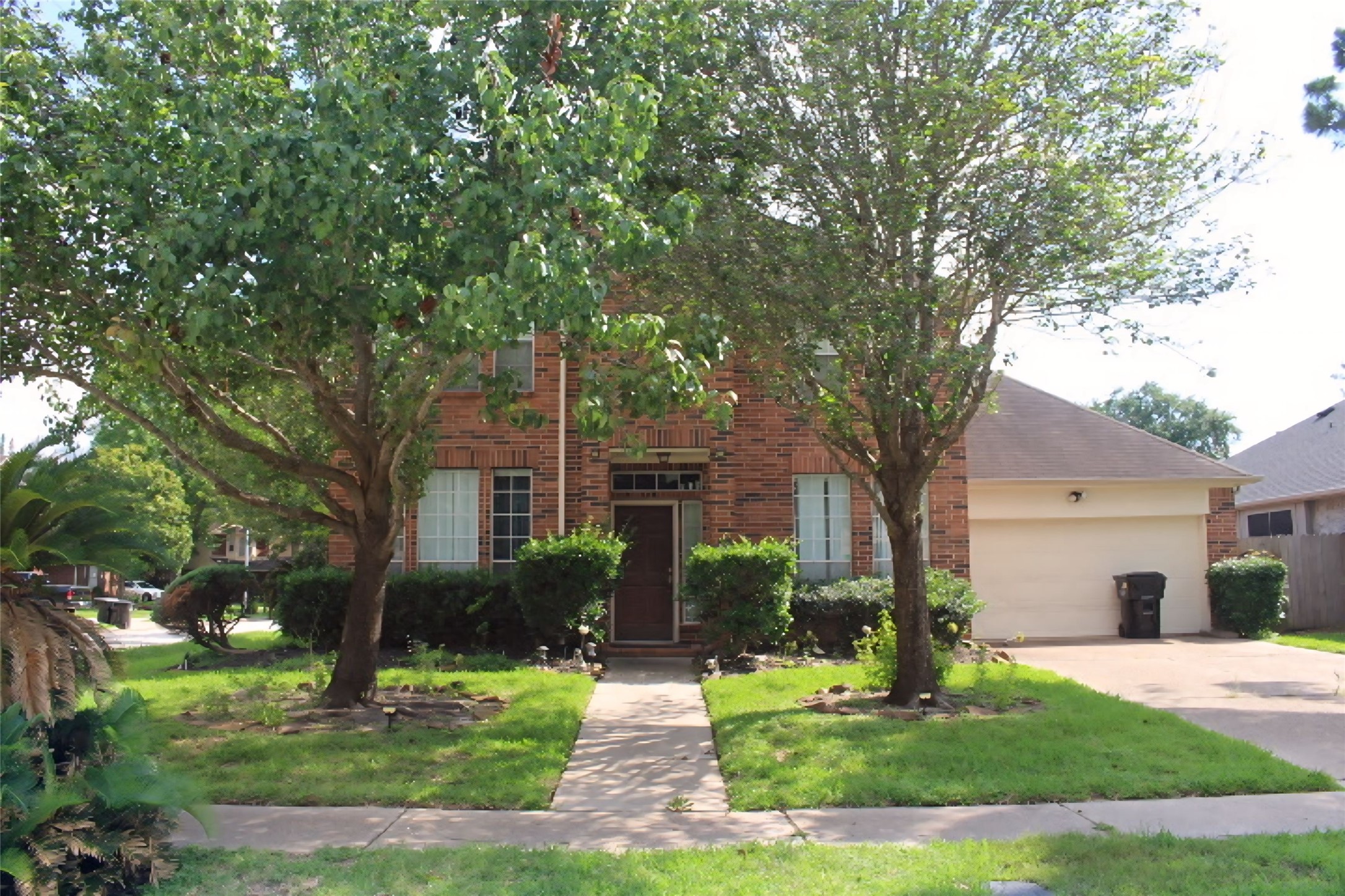 4103 Sablemist Court Houston, TX 77014 - Photo 29 of 29 a front view of house with yard and green space