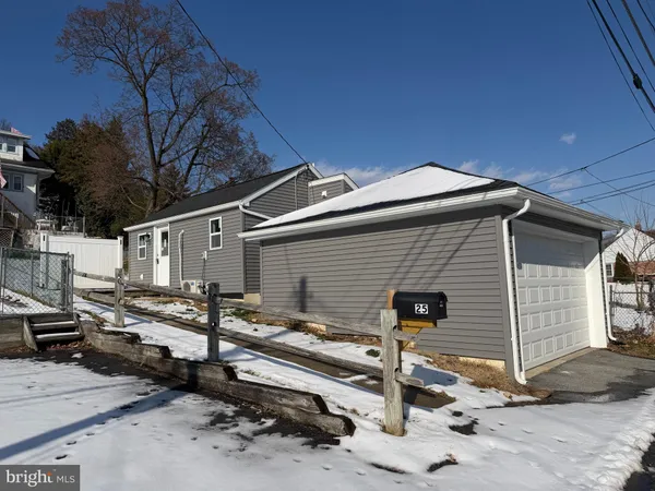 a front view of house with yard outdoor seating and barbeque oven