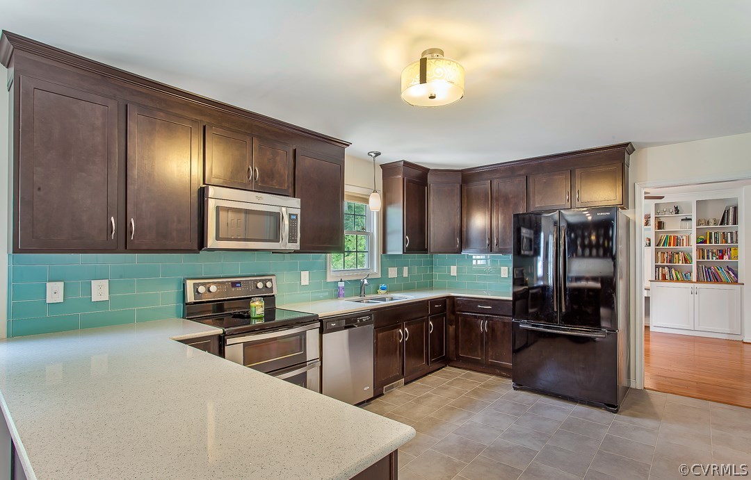 10724 Ethens Mill Road Chester, VA 23831 - Photo 14 of 27 a kitchen with stainless steel appliances granite countertop a refrigerator stove and oven
