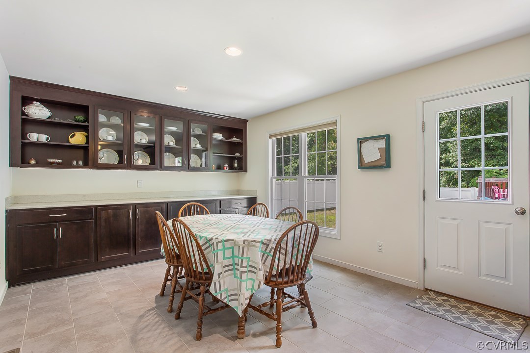 10724 Ethens Mill Road Chester, VA 23831 - Photo 16 of 27 a view of a dining room with furniture and window