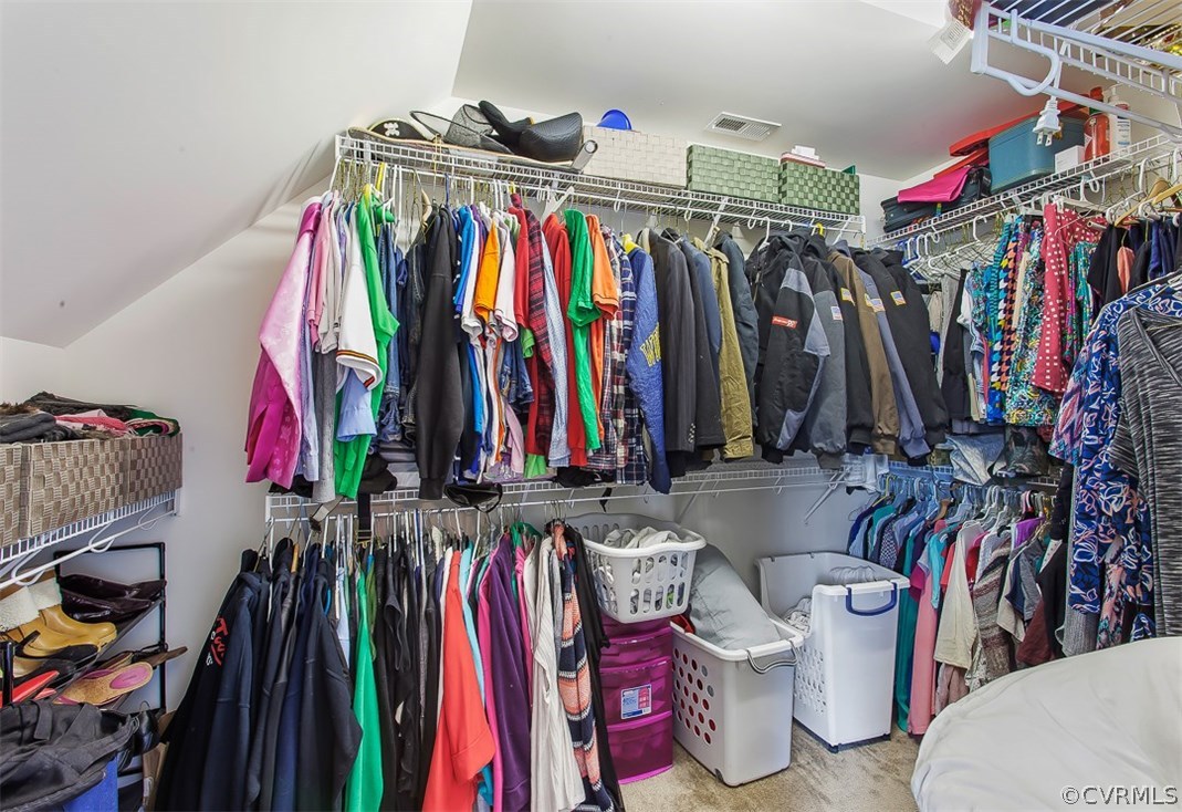 10724 Ethens Mill Road Chester, VA 23831 - Photo 24 of 27 a view of walk in closet with clothes