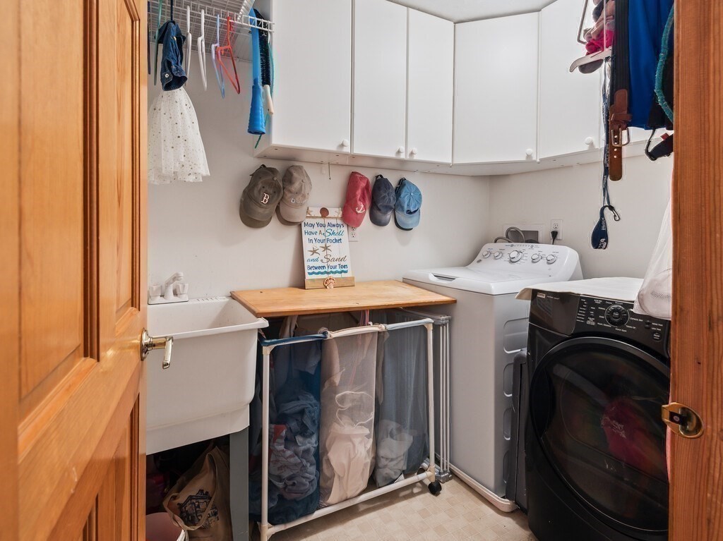 9 Santom Street Auburn, MA 01501 - Photo 24 of 42 a utility room with dryer and washer