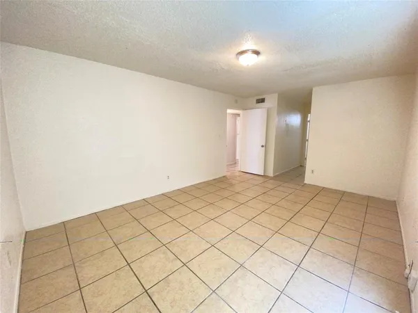 a view of a room & utility room