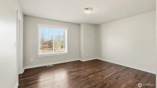 a front view of a house with a yard porch and sitting area