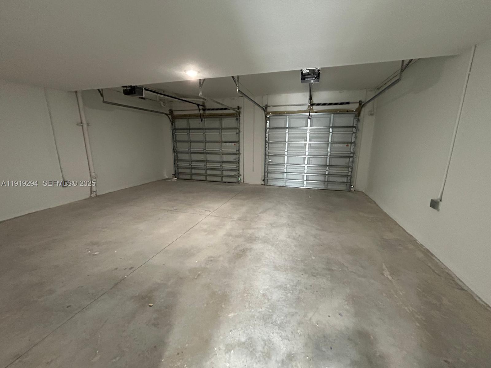 14568 Southwest 261st Terrace, Unit 2 Homestead, FL 33032 - Photo 20 of 22 a view of empty room with an empty space