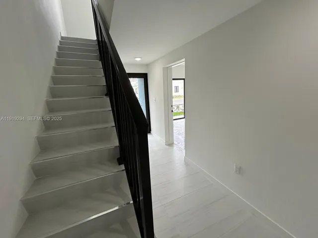 a view of entryway with stairs